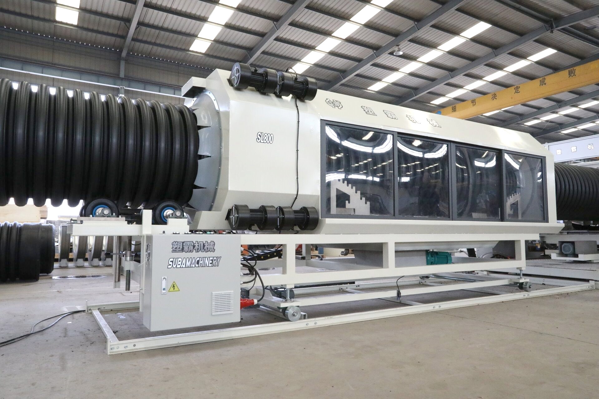 خط إنتاج الأنابيب المموجة SL800 - خط SL800 ينتج أنابيب مموجة بجدار مزدوج HDPE/PP ID200مم–ID800مم للصرف والصرف الصحي بهيكل أفقي وتبريد مائي وبثق - 3